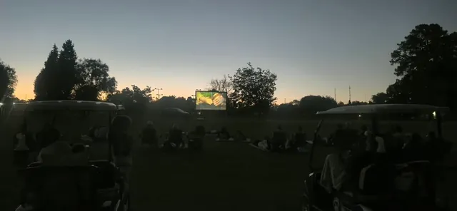 Outdoor movie screen at Middelburg Country Club’s 10th Hole Movie Night with Atomic Garden on site